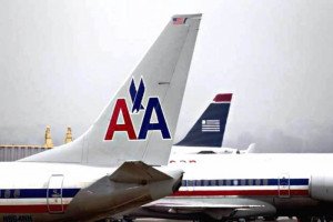 US Airways y American Airlines crean la mayor aerolínea del mundo