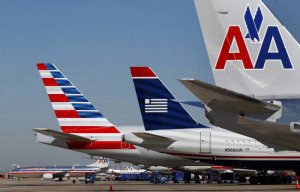 American Airlines redujo casi un 80% sus pérdidas en lo que va de 2013
